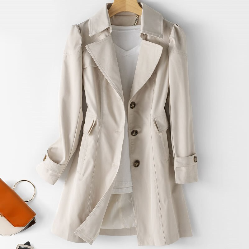 Manteau trench femme avec épaules rembourrées et fermeture à bouton